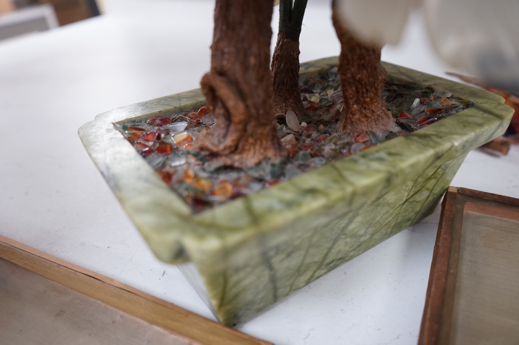 A Chinese carved hardstone and semi-precious stone plant, 44cm high
